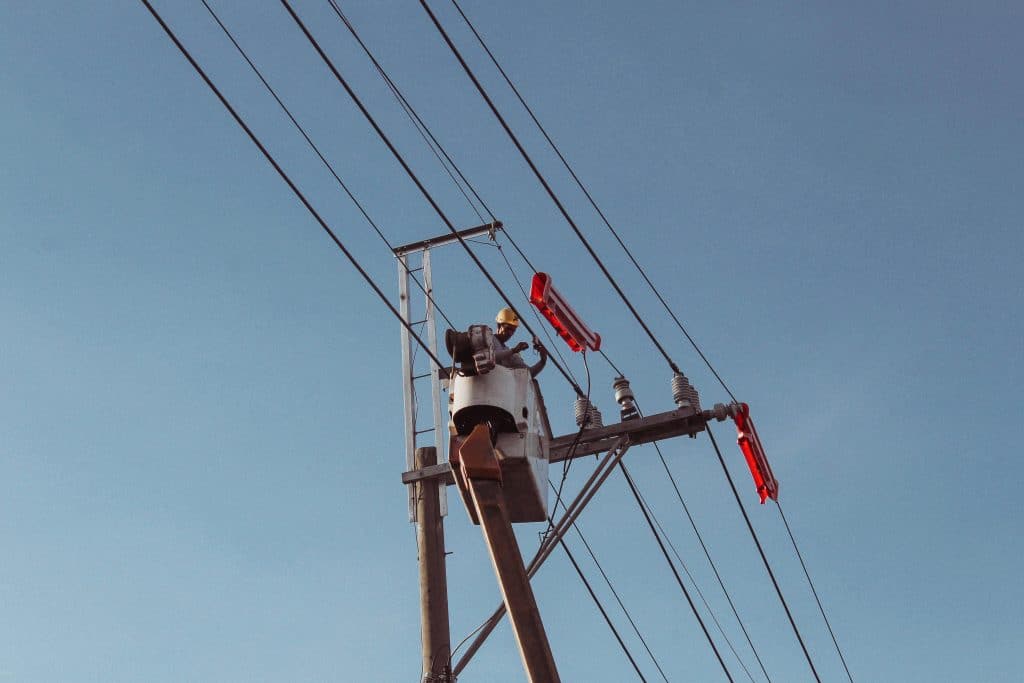 Photo by Roman Castillo: https://www.pexels.com/photo/worker-on-hoist-repairing-power-line-17321815/

Used by; The Writers for Hire, Inc