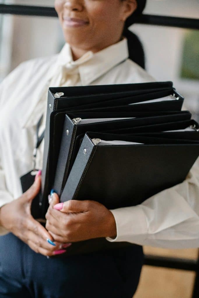 https://www.pexels.com/photo/black-woman-carrying-pile-of-documents-in-office-5668873/

Used by: The Writers for Hire, Inc