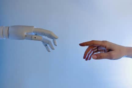 Photo by Tara Winstead: https://www.pexels.com/photo/person-reaching-out-to-a-robot-8386434/ 

Used by: The Writers for HIre, Inc