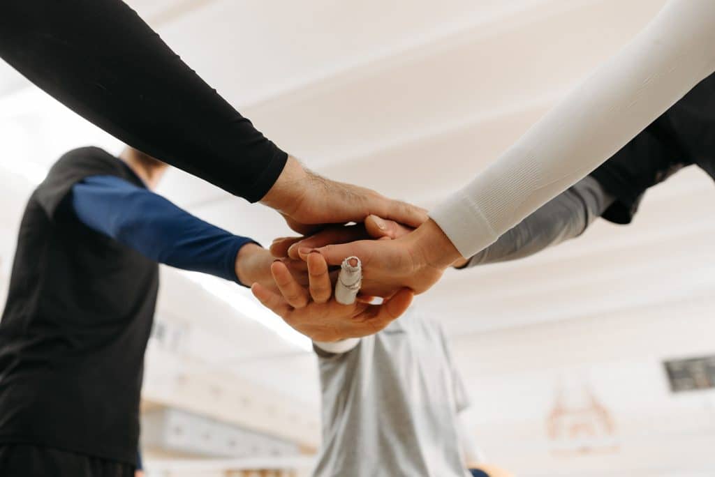 Photo by Pavel Danilyuk: https://www.pexels.com/photo/close-up-shot-of-hands-on-top-of-each-other-6203641/

Used by: The Writers for Hire, inc