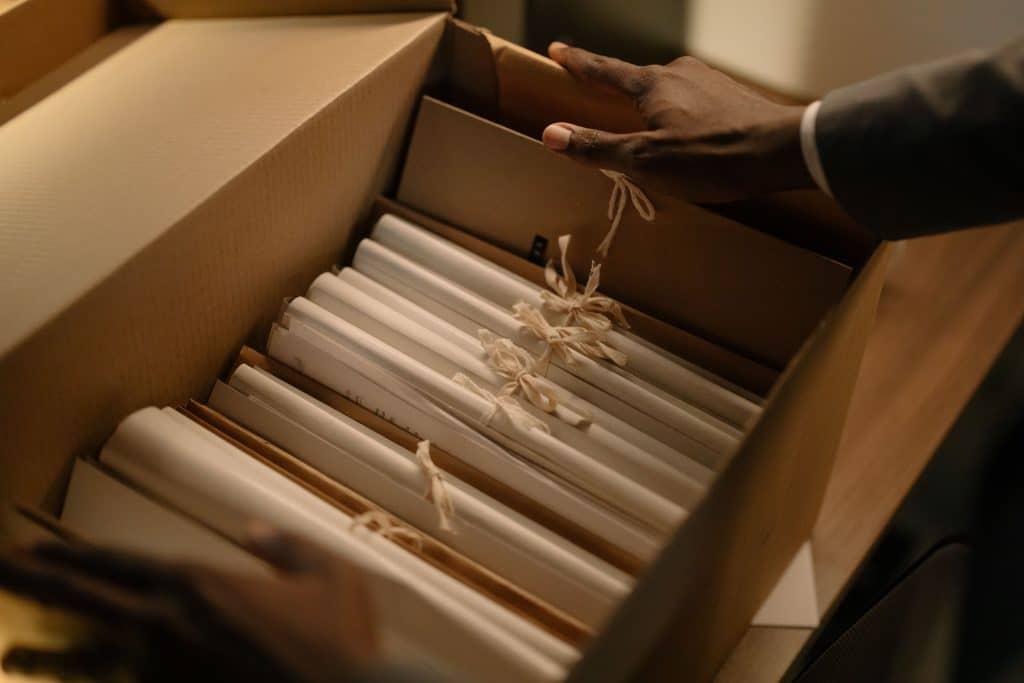 Photo by cottonbro studio: https://www.pexels.com/photo/cardboard-box-full-of-file-folders-8371705/

Used by: The Writers for Hire, Inc