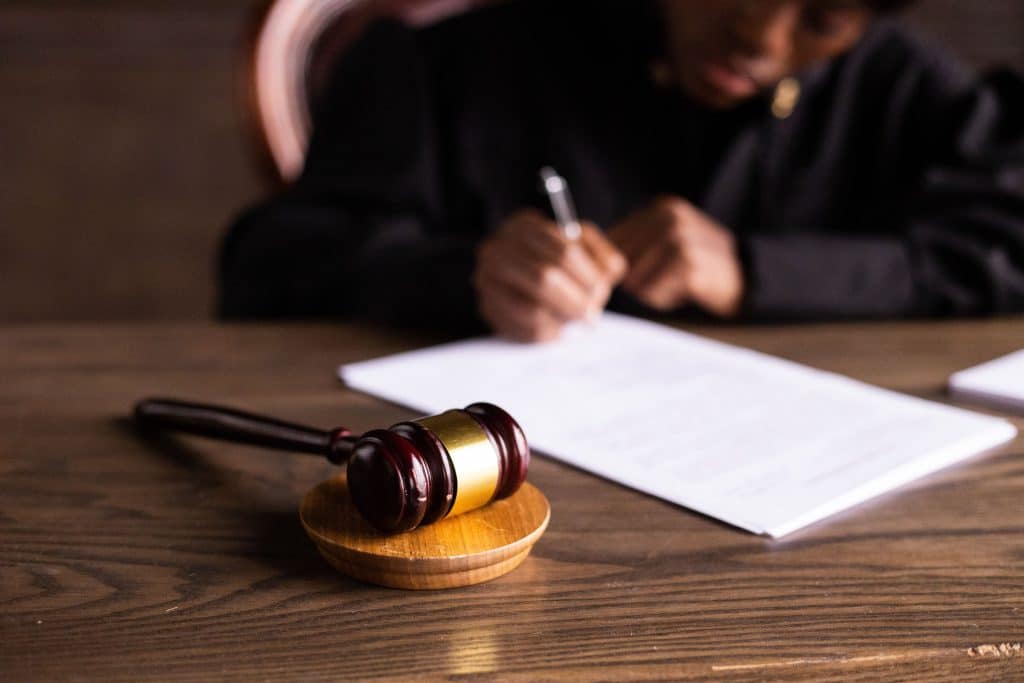 Photo by KATRIN  BOLOVTSOVA: https://www.pexels.com/photo/judge-signing-on-the-papers-6077447/

Used by: The Writers for Hire, Inc