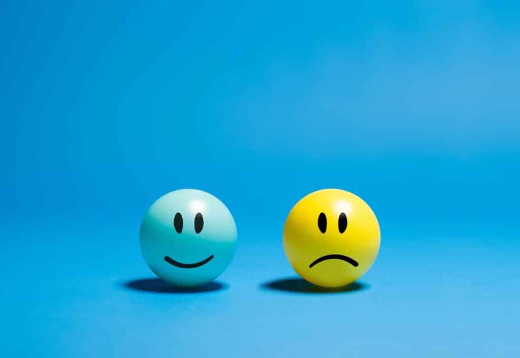 Photo by Sadi Hockmuller: https://www.pexels.com/photo/contrasting-emotions-on-smiley-balls-29205873/ Used by: The Writers for Hire, Inc